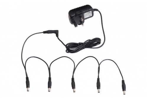 RockPower NT 50 - Power Supply Combo Pack, 9V DC, 1.300 mA, (-) center + Daisy Chain w/ 5 outputs, UK Plug RockPower NT 50 - Power Supply Combo Pack, 9V DC, 1.300 mA, (-) center + Daisy Chain w/ 5 outputs, UK Plug